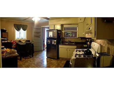Kitchen. First floor well kept kitchen and door le