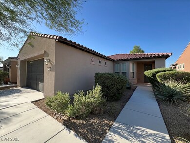 View of home's exterior with stucco siding, an att