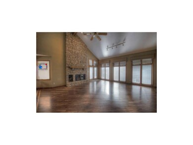 Pella windows with enclosed blinds, stacked stone 