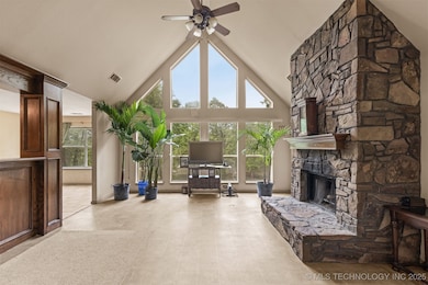 Vaulted Living room with gorgeous view of the land