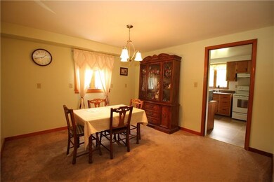Newer Carpeting in 12x11 Dining Room w/ Chandelier