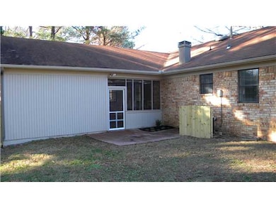 Patio off of screened-in porch.