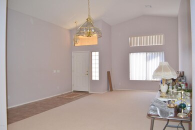 FORMAL LIVING RM WITH VAULTED CEILING