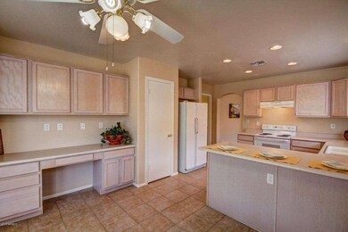 plenty of cabinets & built in desk