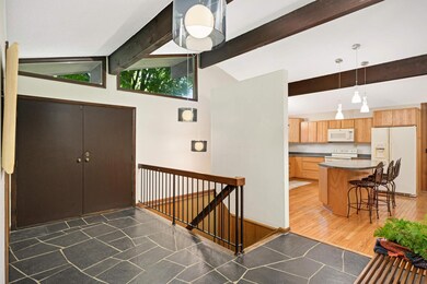 The stone entry is welcoming and so cool.