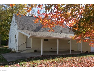 Rear carport and storage area.