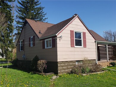 Back corner view, covered porch to the right