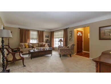 Large living room offers plenty of natural sunligh