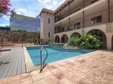 Community pool featuring fence