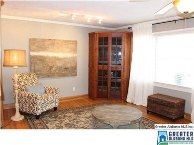 Living Room with Built In Unit and fresh paint. TV