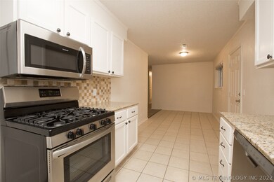 Stainless steel 5-burner gas range.