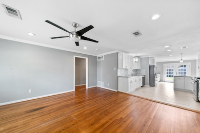 Timeless charm throughout with beautiful original wood floors in the living room and bedrooms.