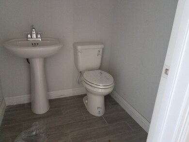 HALF BATH DOWNSTAIRS