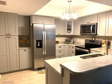 Your new Kitchen offers raised-panel wood cabinets and stainless steel appliances including dishwasher and glass-top stove.