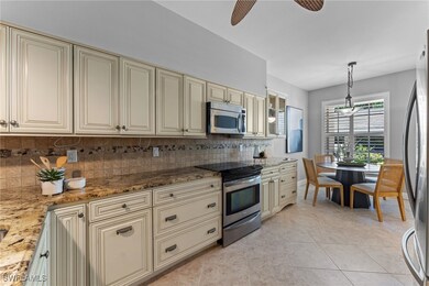 Kitchen featuring stainless steel appliances, crea