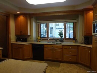 Kitchen. Quartz countertops in beautifully updated