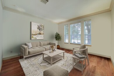 Virtually Staged Living Room off the 2 story Entry Hall
