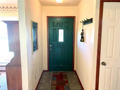 Entry into the house from the front door, the nort