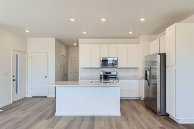 14578 W 90th Ln Unit D  Kitchen 2