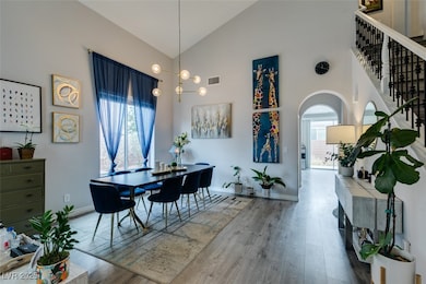Living area featuring baseboards, visible vents, w
