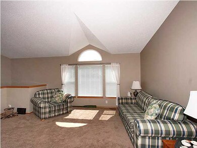 Spacious living room with lots of natural light.