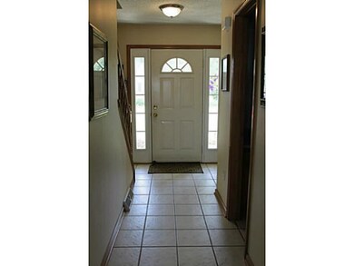 Foyer Foyer with tile flooring