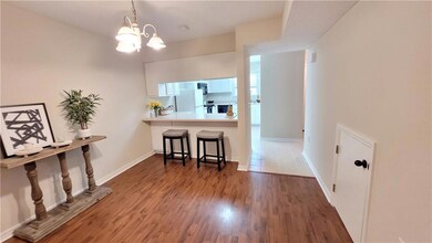 Large living and dining space with additional coun