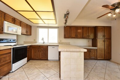 Kitchen with tile countertops