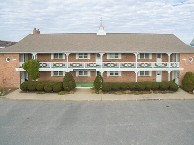 This end unit condominium is located...