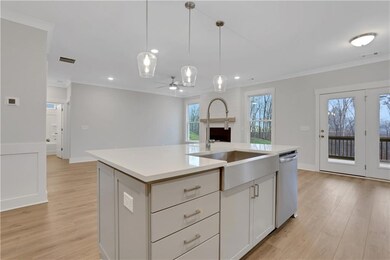 Photos are of a similar home.