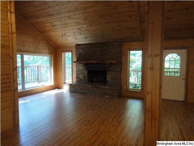 View at the entry. Awesome fireplace, lots of natu
