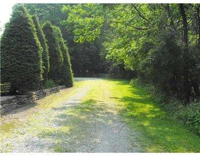 Yard/Garden. Pretty driveway welcomes guests to yo