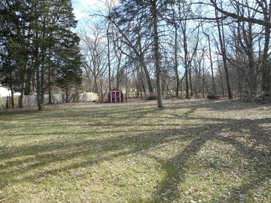 409 W Miller Rd, Lansing, MI 48911 - photo 2