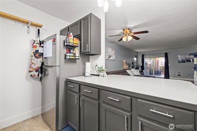 Enjoy the convenience of a well-designed kitchen with stainless steel appliances, a functional layout, and a window view that brings in brightness as you take care of daily tasks.
