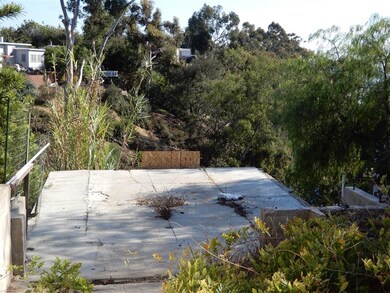 This is a footprint/foundation of an existing structure located at the rear of the property. You could possibly rebuild another structure since something existed here before. All to be confirmed by buyer with the City of San Diego.