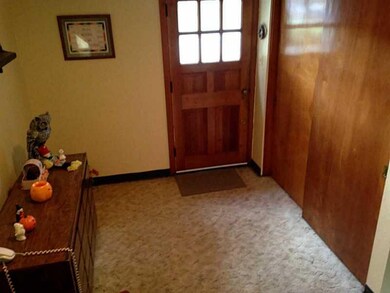 Entry/Foyer. You enter a cheery foyer with double 