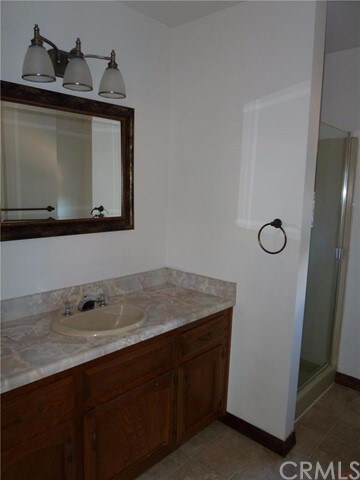 Master bath has new vinyl, paint, toilet and vanit
