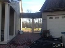Covered Breezeway to large 3 car garage