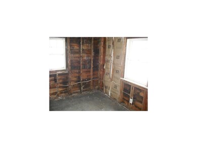 Interior Space/Layout. Unfinished room off kitchen