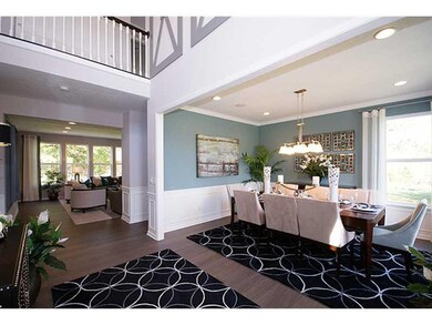 Dining Room. Home is under construction.  Photo is of a similar model.