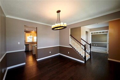 Accessible to the kitchen, the dining room is read