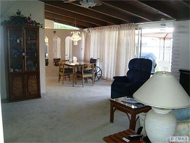 Looking from entry thru living room to dining room