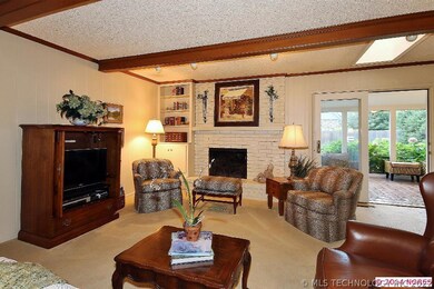 THE GREAT ROOM HAS A GAS OR WOOD BURNING FIREPLACE
