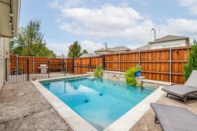 Beautiful Ashton Wood home with stone and brick ex