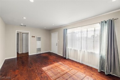 Spare room featuring recessed lighting, wood finis