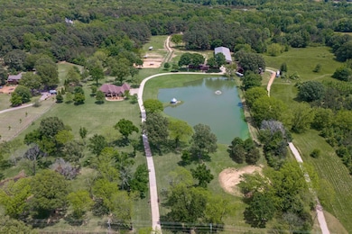 Aerial view of property and surrounding area featu