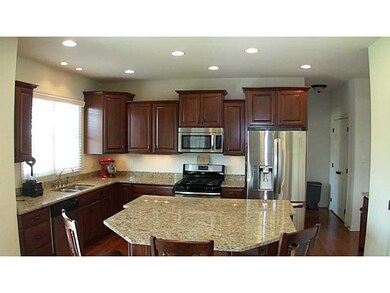 Kitchen. Additional recessed lights, cherry cabine