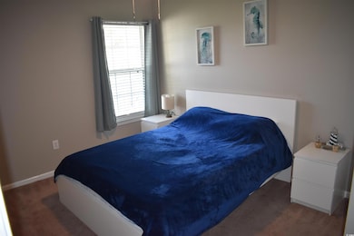 Bedroom featuring carpet floors