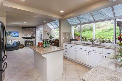 Kitchen looking into family room with view of stac