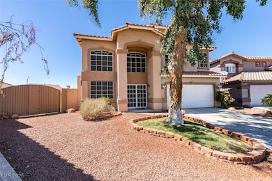 Mediterranean / spanish-style home featuring stucco siding, a gate, driveway, a tile roof, and an attached garage